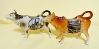 Breslau and Elsenborn souvenir cow creamers