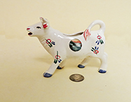 Similar but smaller German Niagara Falls souvenir cow creamer