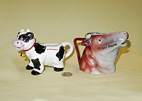 Wisconsin and Harbor Springs souvenir cow creamers