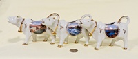 Le Portel, St Malo, and Dieppe souvenir cow creamers