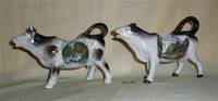 Souvenir cow creamers from Burg Sorenwald and Dessau