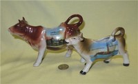 Landau in der Pfalz and St Mary's Island souvenir cow creamers