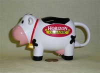 Plastic cow creamer from Horizon Organic, left