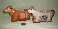 Two Devon souvenir cow creamers