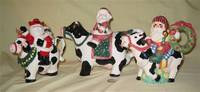 3 more santa/cow teapots