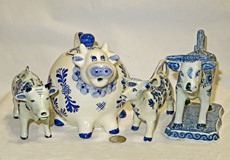 4 misc Delft cow creamers