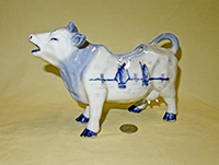 Large stout Delft cow creamer. left