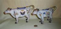 2 faience cows