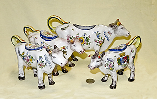 Four Renoleau cow creamers