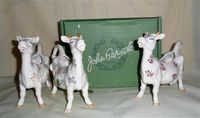 Three Beswick satire mouthless cow creamers