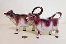 Two realistic Goebel brown cow creamers
