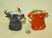 2 Mitchell Woodbury cow head creamers