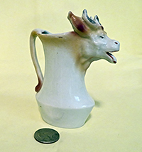 German bull head on vase creamer