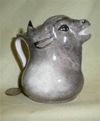 Grey buffalo head creamer