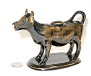 Gilded thin Jackfield cow creamer