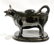 Jackfield souvenir cow creamer from Penzance