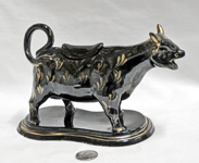 Jackfield souvenir cow creamer from Goldthorpe, side