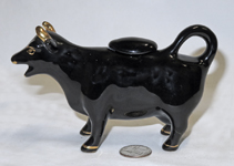 Small Jackfield glaze cow creamer