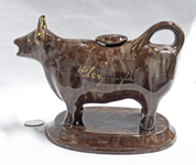 Souvenir cow creamer from Aberystwyth