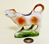 British cow creamer on green base