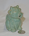 Sitting green cow creamer