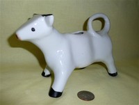 Male white cow creamer