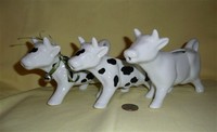 Pier 1 and Wiklliams Sonoma black and white cow creamers