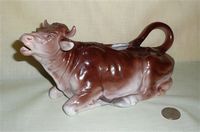 Superb German porcelain Brown lying down cow creamer marked for Hanover