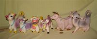 six purple cow creamers