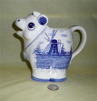 Taiwan cow creamer with blue windmill