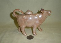 Light brown UK cow creamer with lid
