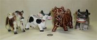 Four interesting Japanese cow creamers