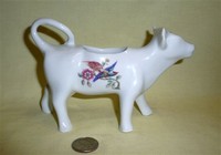 French white cow creamer with bird
