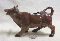 Dark brown Victorian era cow creamer