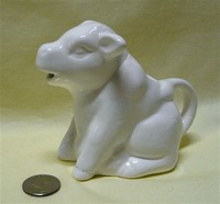 Sitting white cow creamer