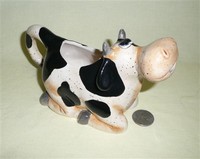 Home Essentials & Beyond caricature happy cow creamer