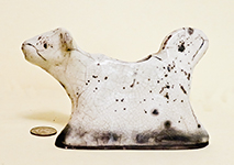 white with black specks filled below strange cow creamer from UK