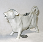 bisque cow creamer with flowers ion horns