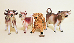 4 brown cow creamers