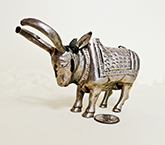 Nandi holy water pot pours through horns