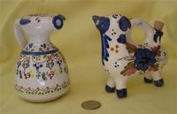 two cow cruets