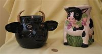 two one hole cow pitchers