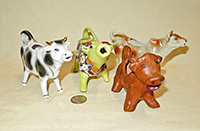 Earthenware cow creamers