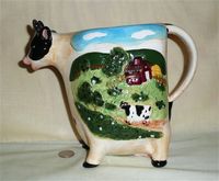 Baum Bros. cow pitcher with farm scene on side