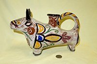 brightly colored standing bull pitcher
