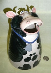 Large mouthed hand made cow pitcher, front