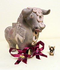 two Peruvian artisan versions of torito de pucara