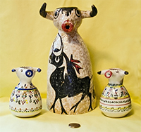 Spanish bull caricature wine jug and cruets