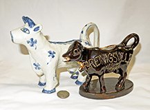 Two American Folk Art cow creamers