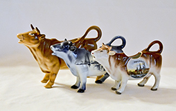 3 German porcalein cow creamers